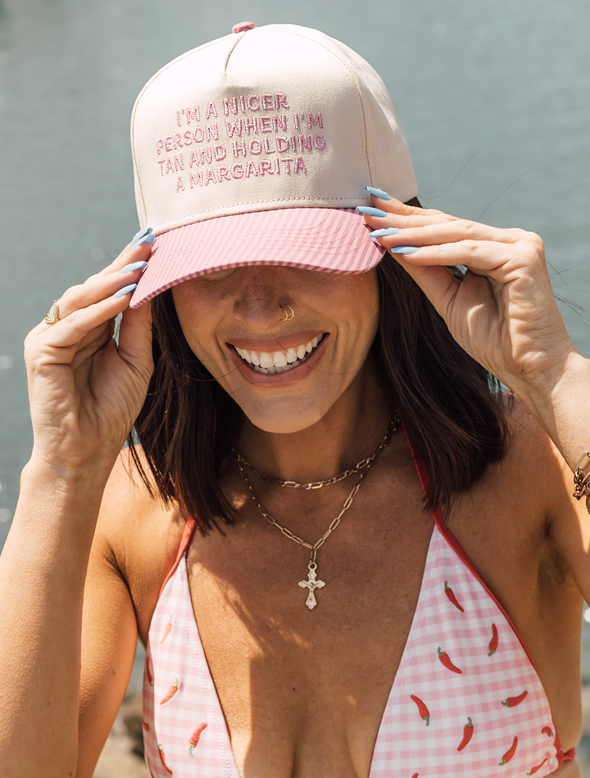 Tan & Holding a Margarita hat
