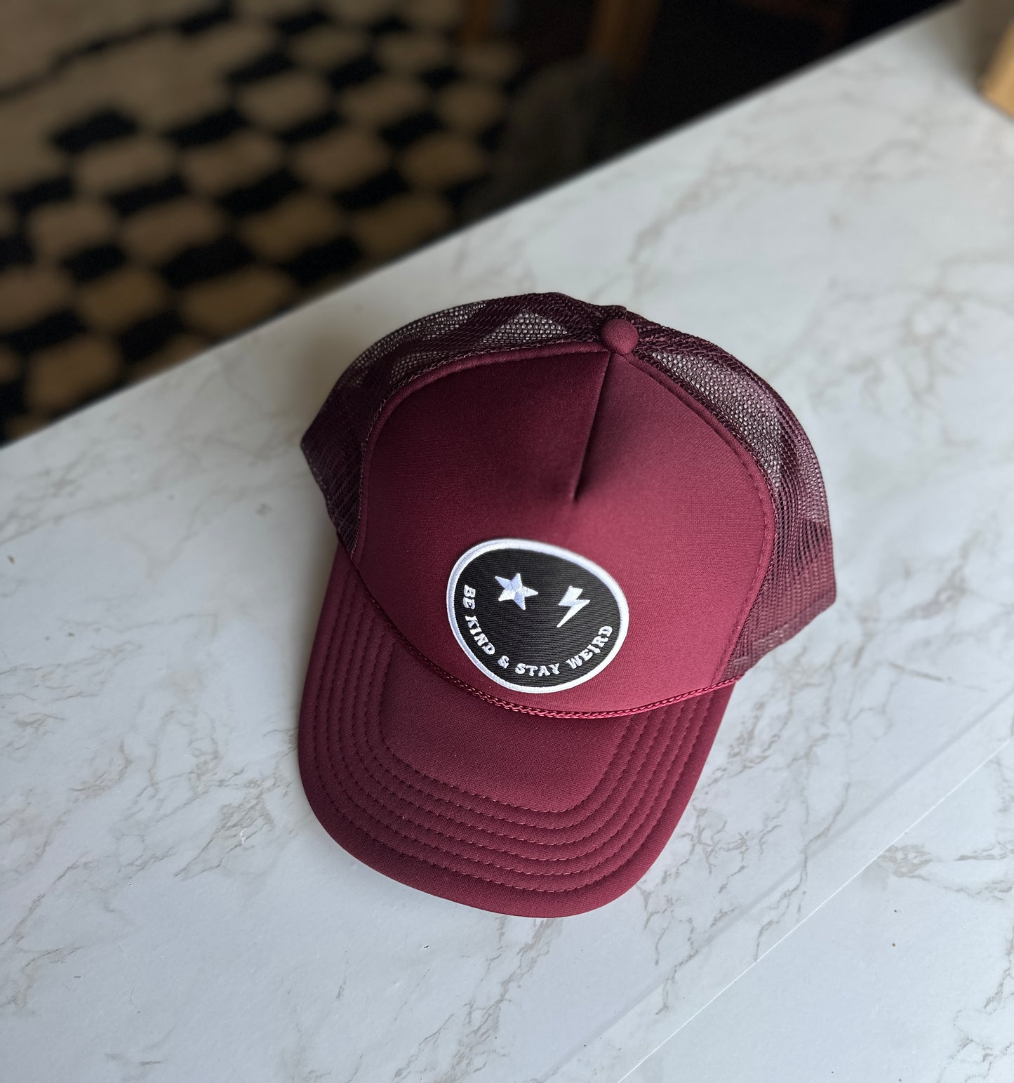 Be Kind & Stay Weird Smiley Trucker hat