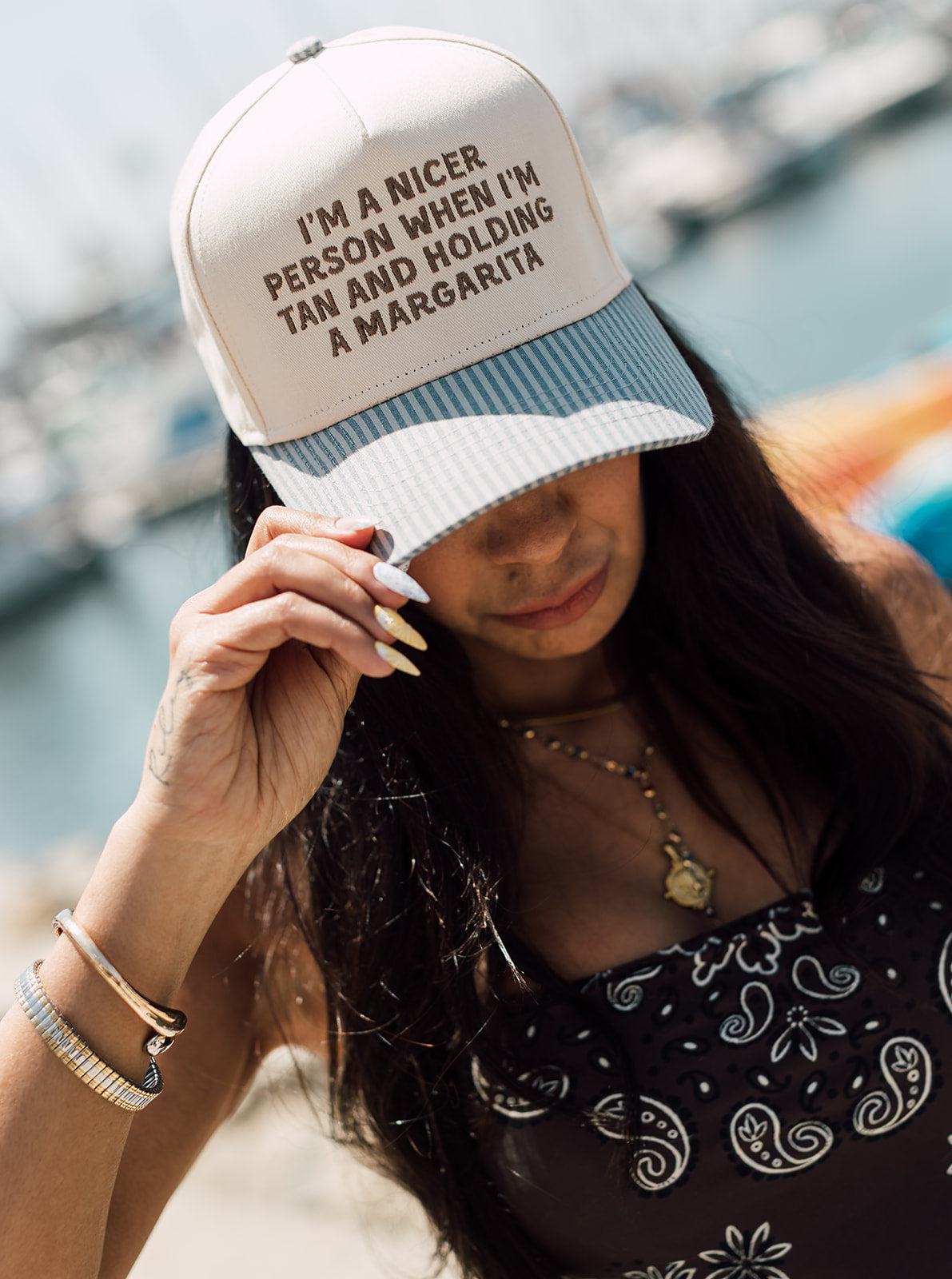 Tan & Holding a Margarita hat